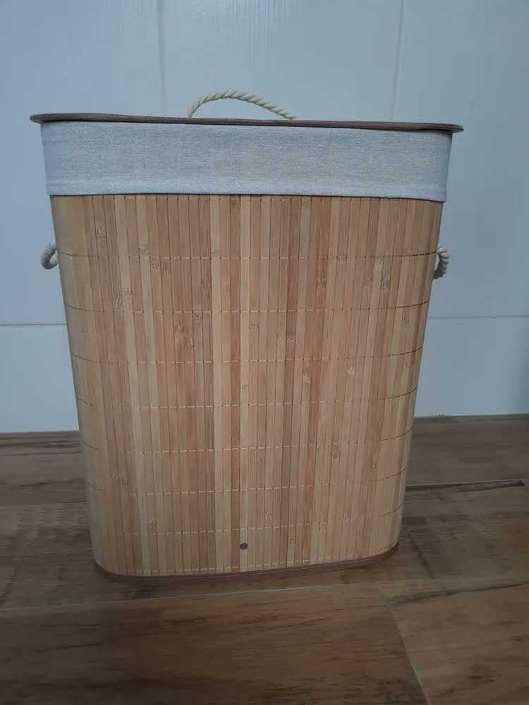 foto de comprador de KONTUZ cesto de roupa suja de bambu com tampa e alças 50l cor Marrom